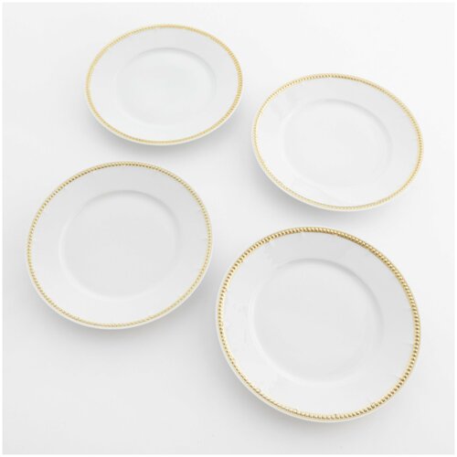 Набор из четырёх тарелок с рельефными золочёными бортами, мануфактура 